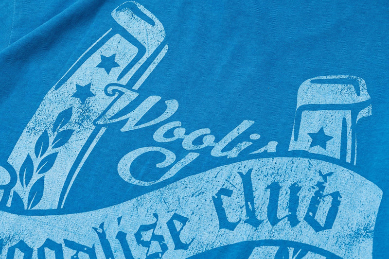 Blue oversized cotton tee with distressed star and script graphic print in vintage wash style