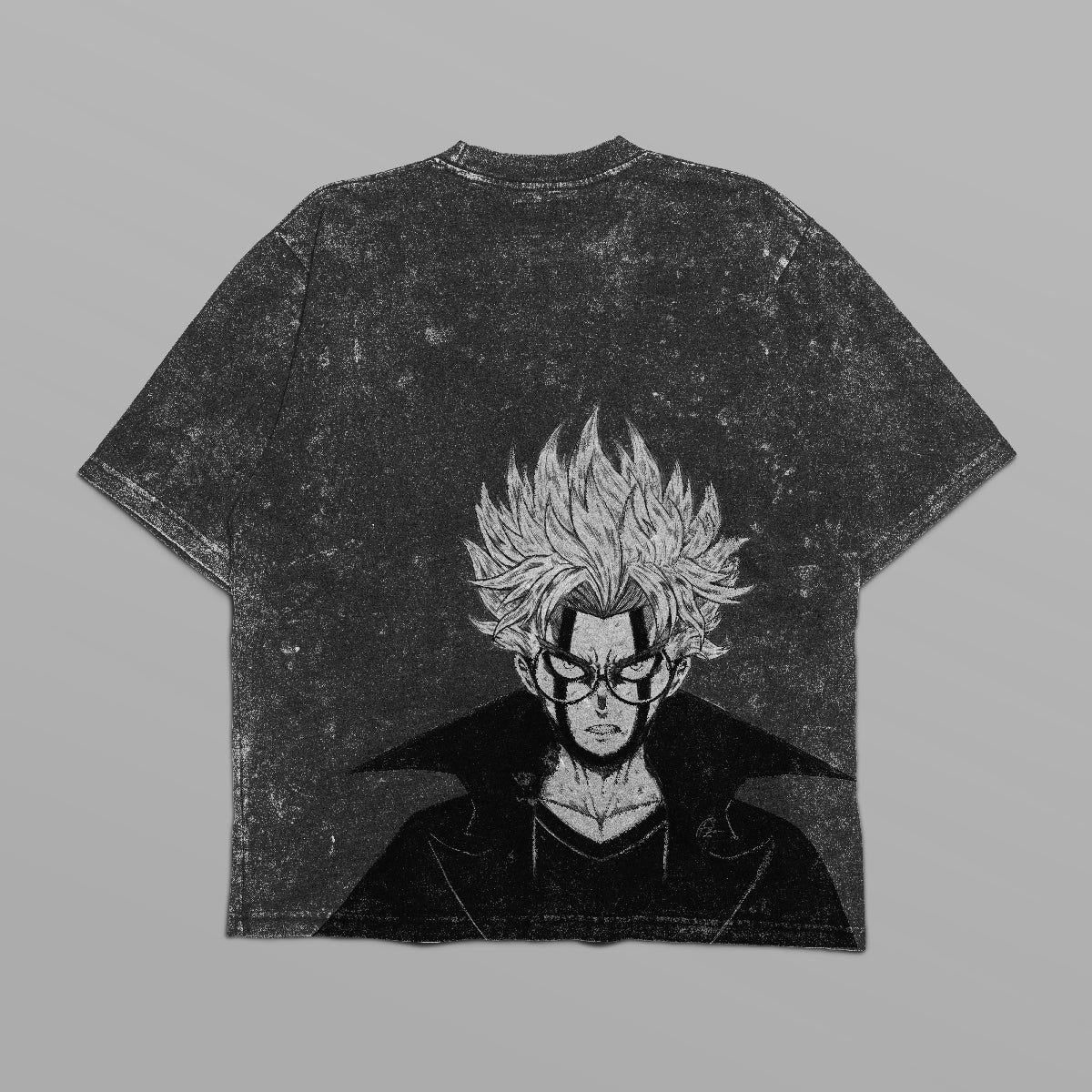 The Dandadan Oversized T-Shirt features a black design with a distressed texture and an anime-style character sporting spiky hair and glasses. The character&