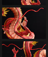 The Seakoff Red Shenron Collectible Figure – Dragon Ball Z, 30cm, showcases a red dragon with an elongated body, wavy tail, vibrant scales, yellow spikes on its back, and sharp claws. The high-detail design thoughtfully divides into three horizontal sections.