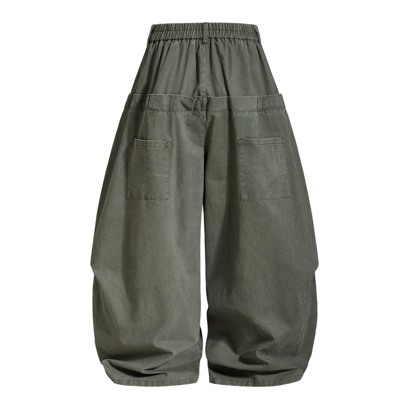 Olive green pants back view with elastic waistband and large back patch pockets
