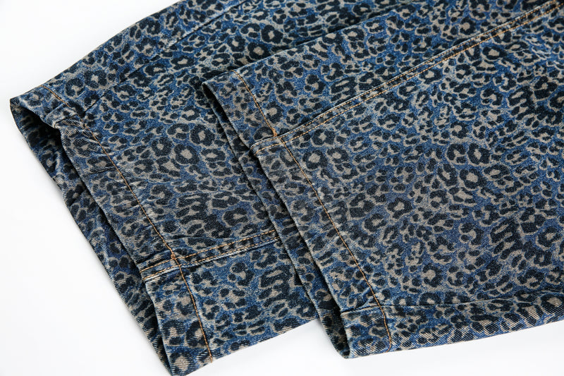 Close-up of blue leopard print jeans hem and lower leg seam