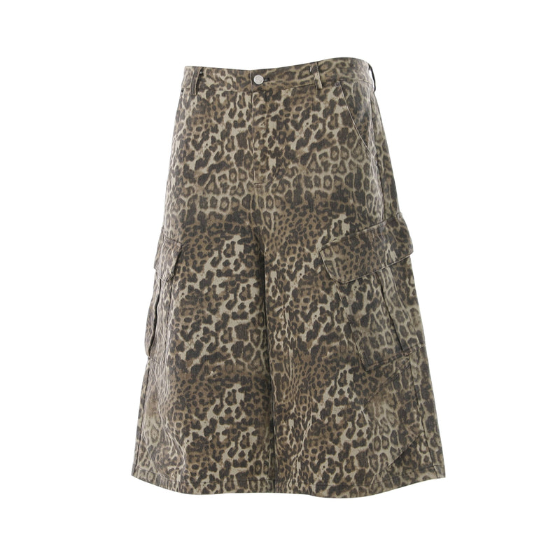 Front angled view of leopard print cargo shorts showing wide legs and cargo side pockets