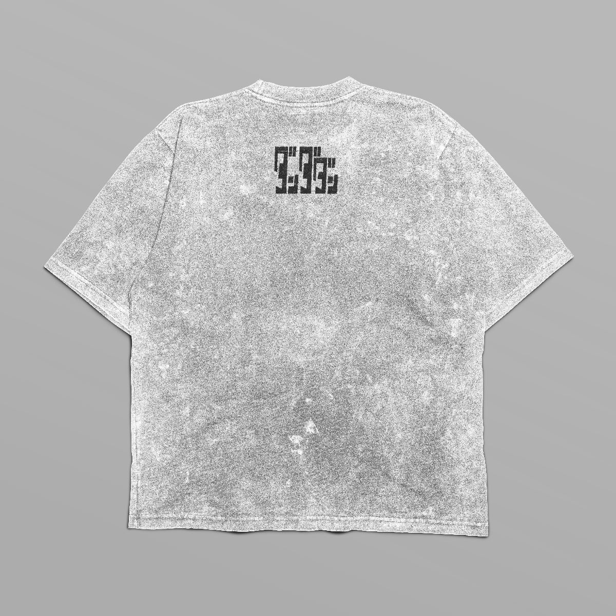 The Dandadan Monochrome Oversized T-Shirt features an Okarun graphic and a logo on the back. Its weathered gray texture and anime streetwear style are enhanced by its flat gray background, offering a contemporary look.