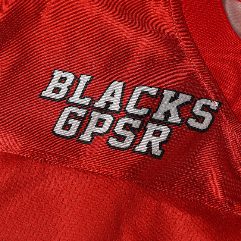 Close-up of a red Bugs Bunny football jersey with Blacks GPSR lettering and textured mesh fabric.