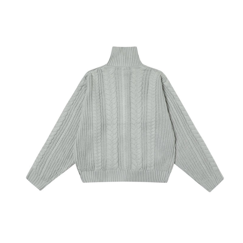 Light gray cable knit zip-up turtleneck sweater, back view with ribbed collar
