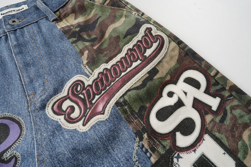 Close-up of side back panel with Sparrow spot script patch and bold SP2 graphic