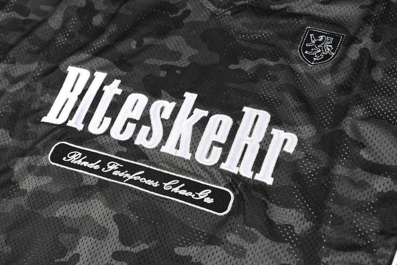 Black camouflage mesh football jersey with Bleeskeri lettering and embroidered crest on the chest