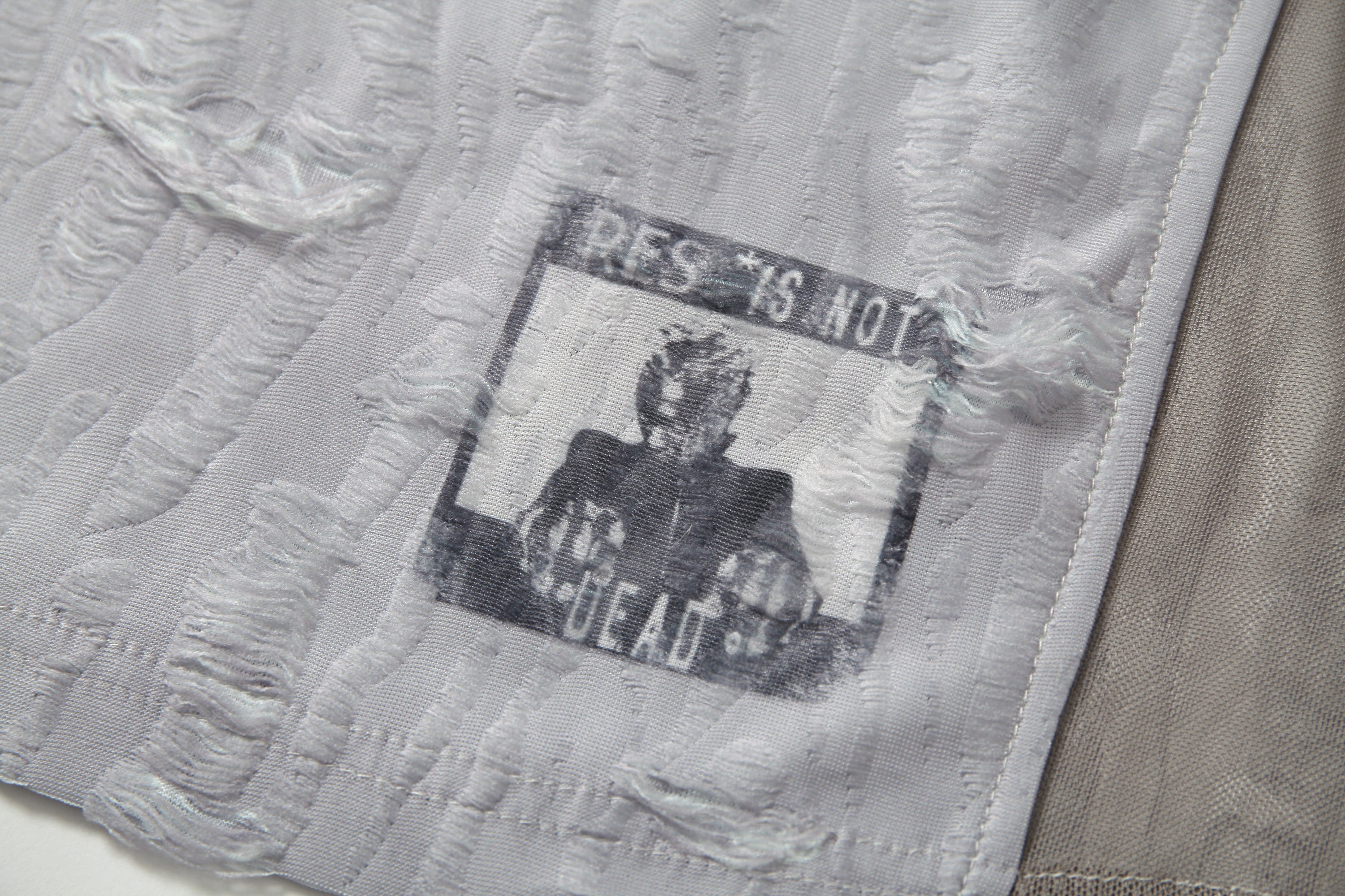 Omirad Textured Mesh Patchwork Tee | Distressed Graphic Jersey