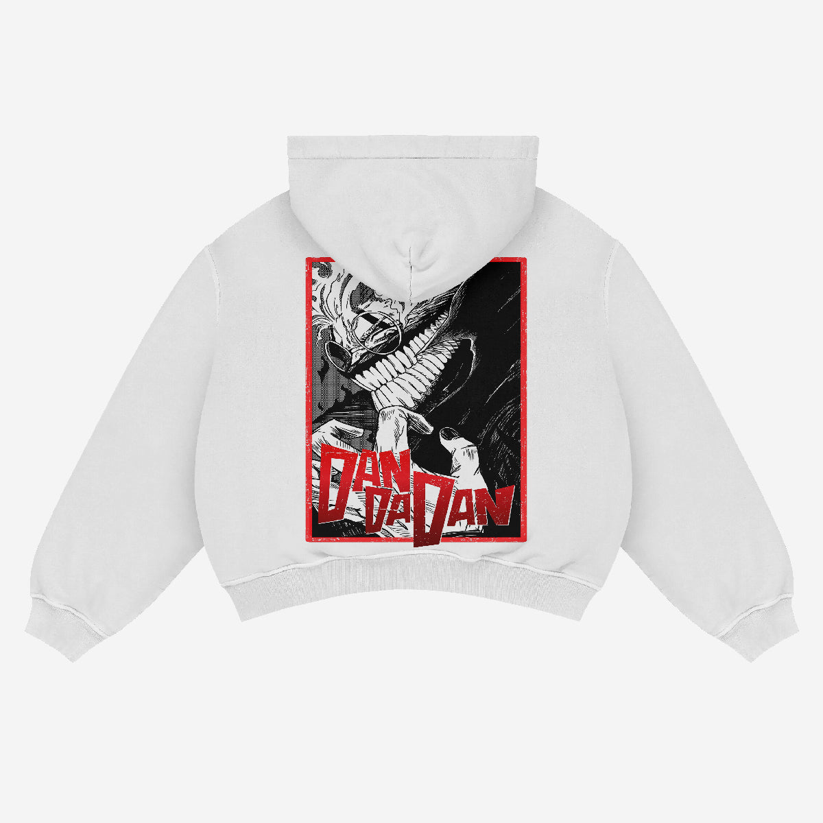 The Dandadan Hoodie, crafted from premium 360 GSM cotton, features an Okarun manga panel design with a stylized grinning face and sharp teeth on a white background. &quot;Dan Da Dan&quot; is boldly displayed in red at the bottom. Suitable for any gender, this streetwear piece is shown from the back.