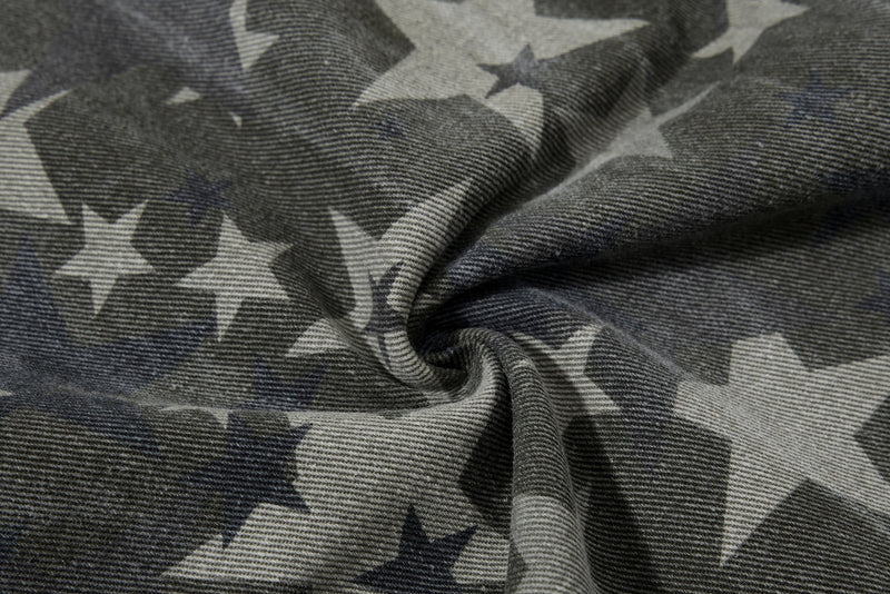 Close-up of star print denim fabric with gathered texture