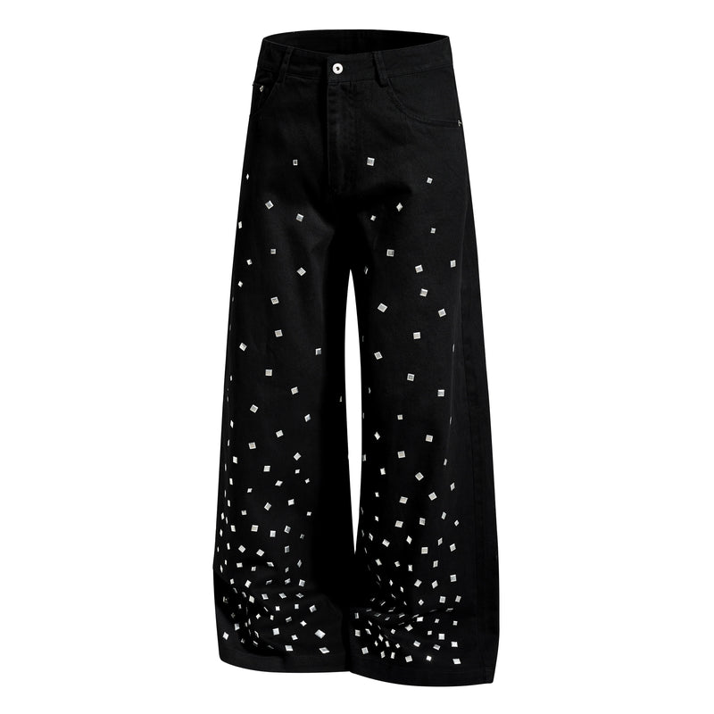 Black wide-leg denim pants with silver stud squares, angled front view