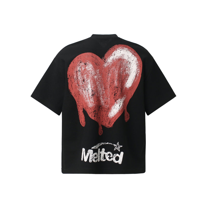 Black graphic tee with oversized distressed red melted heart print and white Melted logo on the back