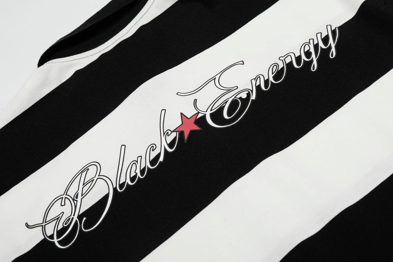 Black and white striped graphic polo shirt with bold cursive lettering and a red star accent