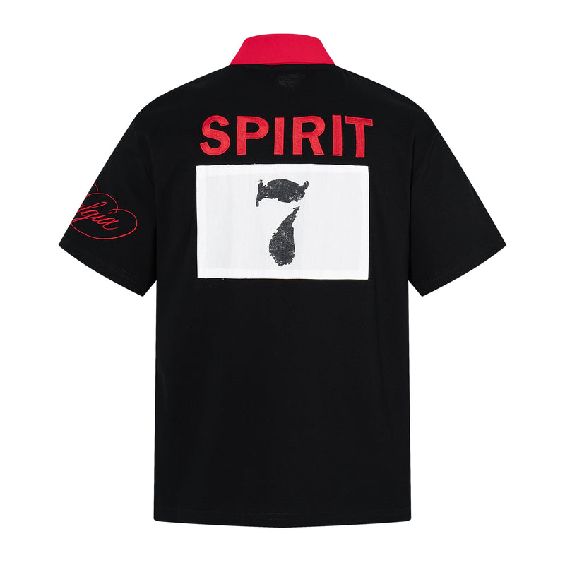 Black oversized polo tee with red collar, SPIRIT back print, and bold gothic number 7 graphic
