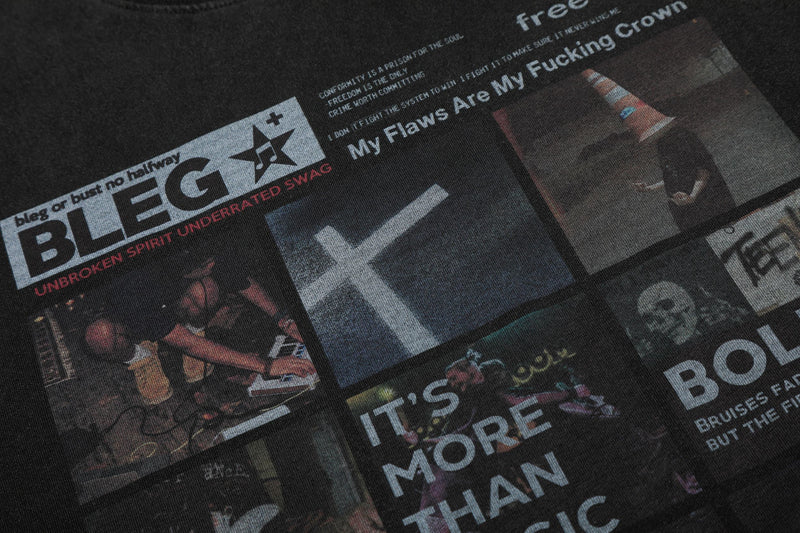 Black vintage washed graphic T-shirt with collage-style punk-inspired text and concert poster prints