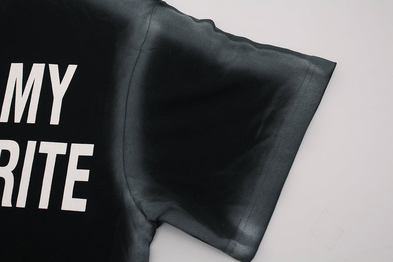 Black oversized tee with bold white slogan print and dark gradient short sleeve on a white background
