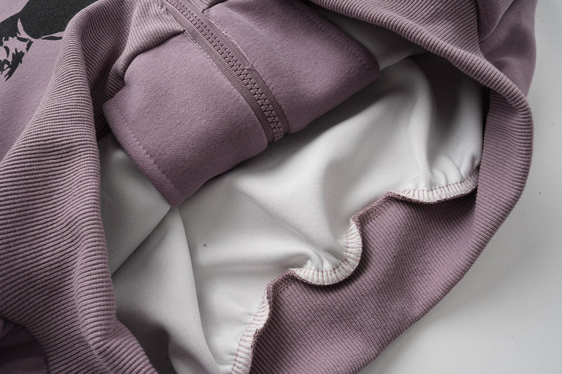 Interior view of lavender hoodie with white lining and ribbed trim