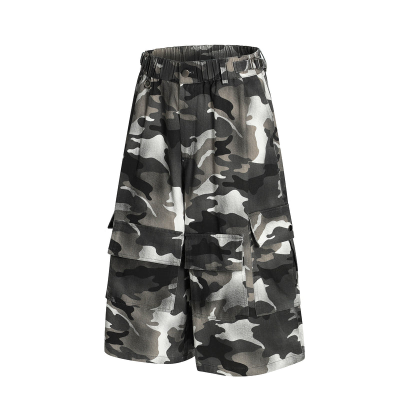 Front view of gray and black camo cargo shorts with elastic waistband and flap cargo pockets