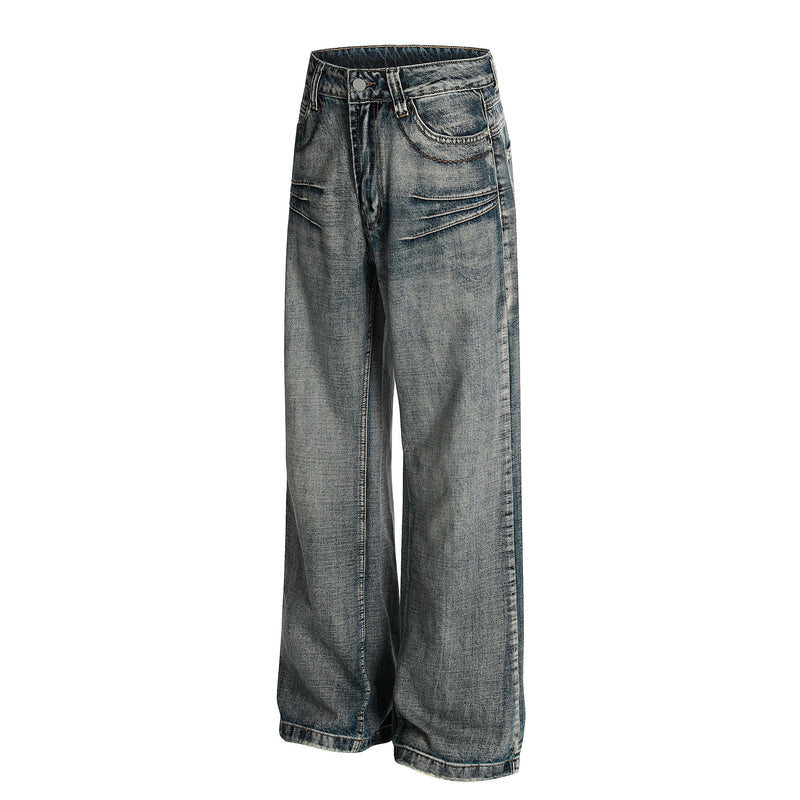 Angled front view of retro wide-leg denim jeans in faded blue wash with stitched pocket details