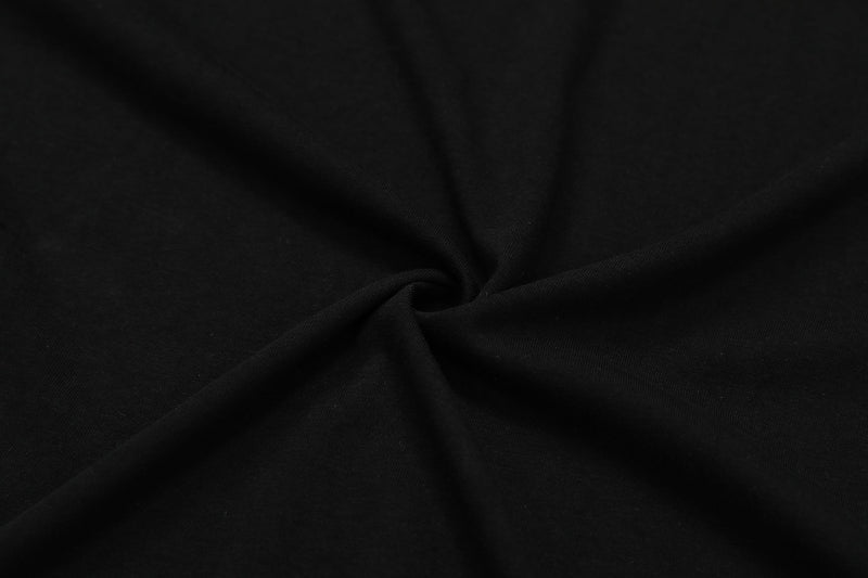 Close-up of black fabric texture with gathered folds