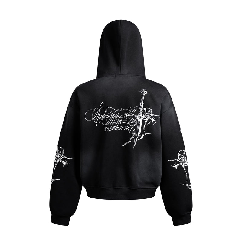 Back view of black hooded sweatshirt with white gothic cross print across the shoulders