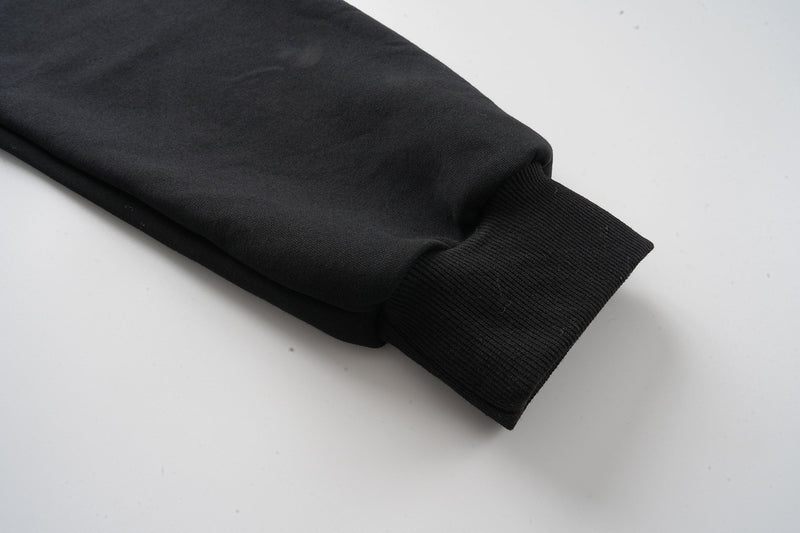 Close-up of black sleeve cuff on the hoodie
