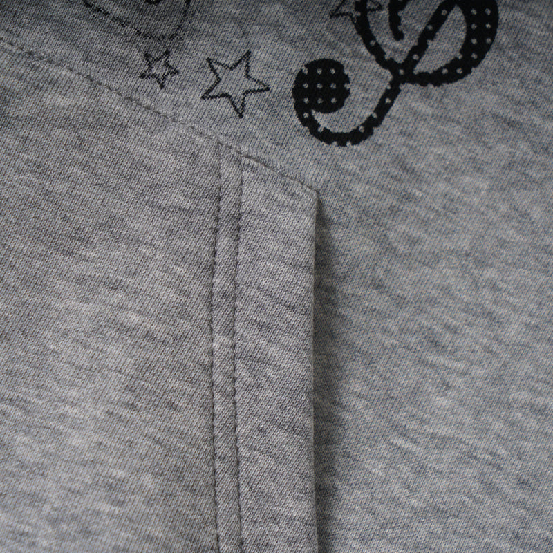Close-up of front pocket seam and lower graphic on gray hoodie