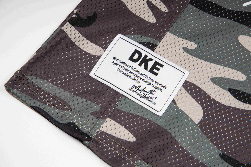 Camouflage mesh football jersey tee with DKE chest patch and oversized streetwear style
