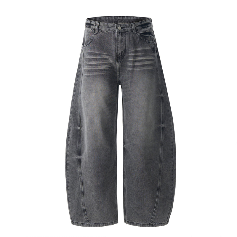 Front view of vintage grey washed barrel-leg denim jeans with wide legs