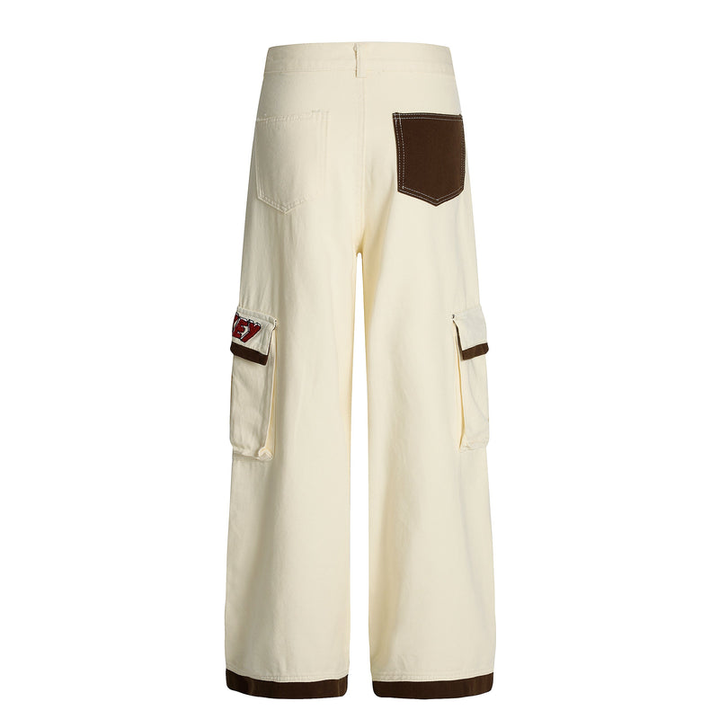 Cream cargo pants back view with contrast brown back pocket and side flap pockets