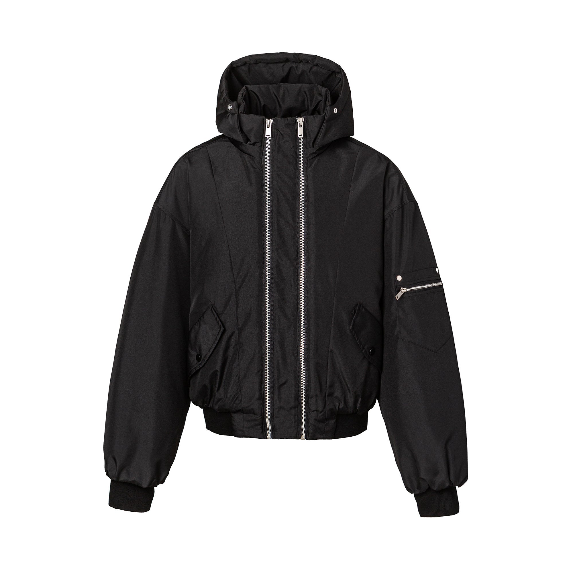 Black oversized hooded puffer jacket with dual silver front zippers and sleeve utility pocket, front view