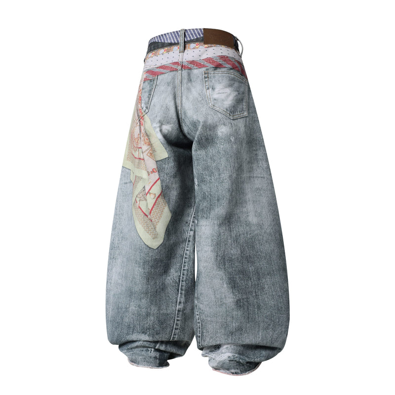Back view of wide leg distressed jeans with faded denim and patchwork waistband