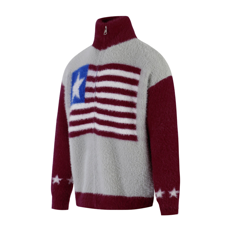Three-quarter front view of fuzzy half-zip sweater with flag graphic and burgundy sleeves