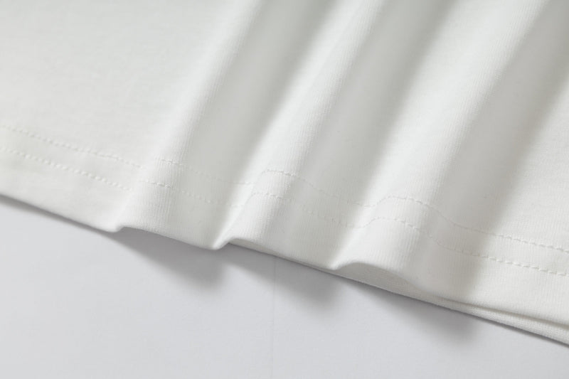 Close-up of white shirt hem and seam stitching detail