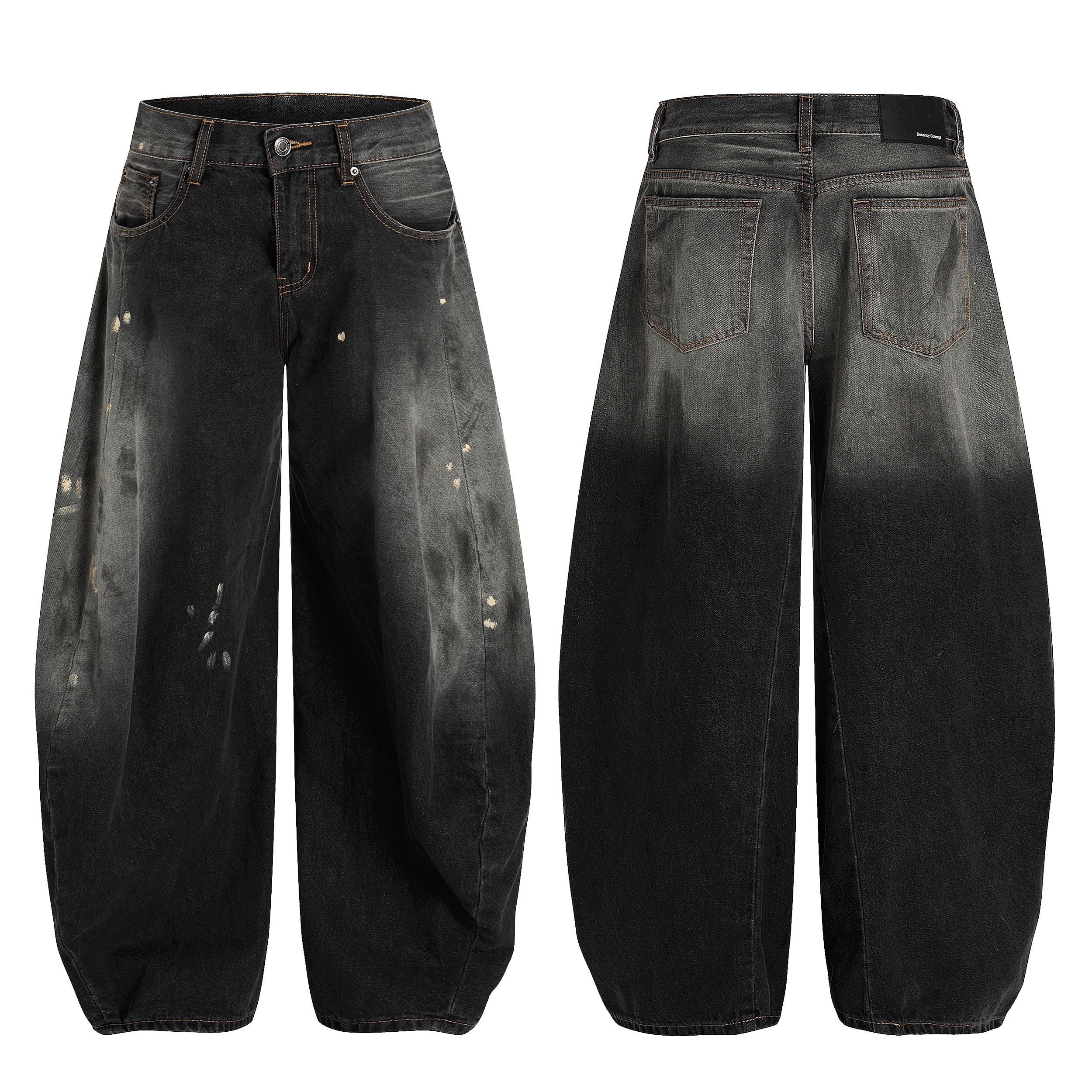 Front and back view of black vintage wash barrel leg jeans with distressed splatter accents and gradient fading