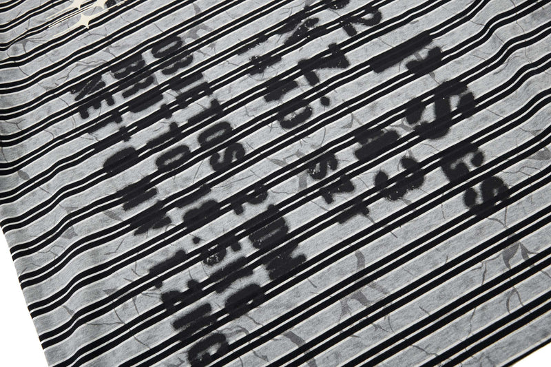 Black and gray striped streetwear T-shirt with abstract graffiti-style print on soft cotton fabric