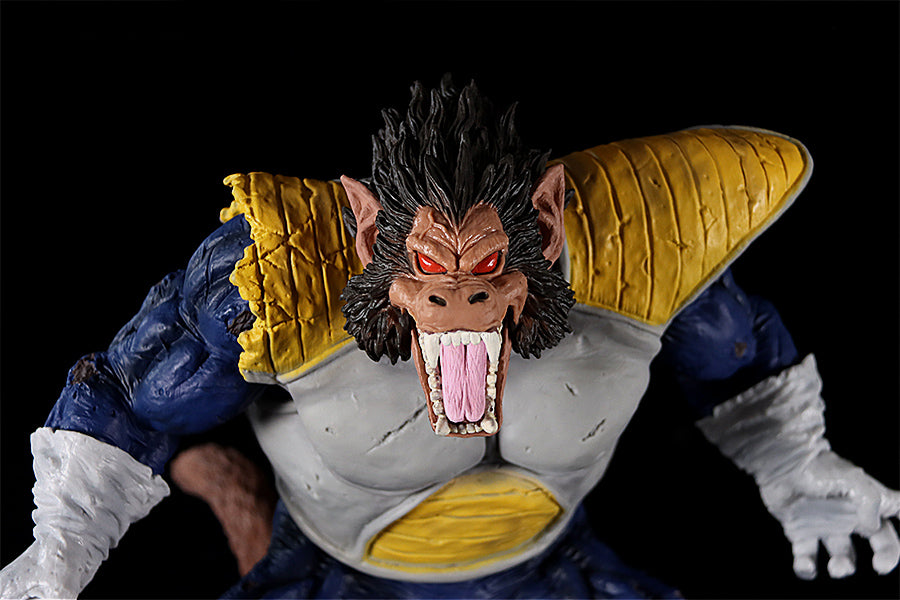 The Seakoff Great Ape Vegeta Collectible Figure is a 36cm Dragon Ball Z action figure. It features a fierce, gorilla-like creature with red eyes, an open mouth, sharp teeth, and a menacing expression. Adorned in blue and yellow armor, it makes an impressive collectible against a black background.