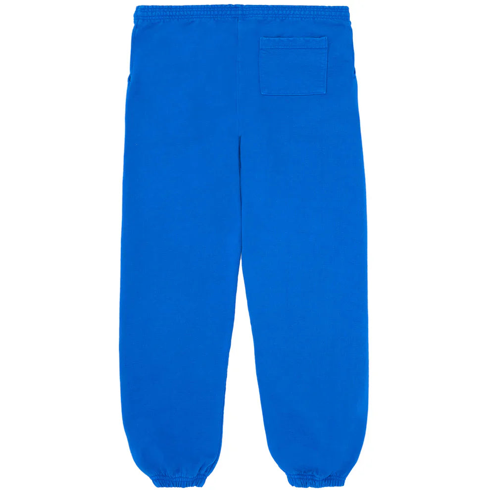 Sp5der Sweatpants – Unisex blue cotton joggers with yellow side logo, star print, elastic waistband, cuffed ankles, and a single right patch pocket—ideal streetwear for a casual look.