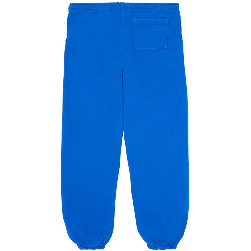 Sp5der Sweatpants – Unisex blue cotton joggers with yellow side logo, star print, elastic waistband, cuffed ankles, and a single right patch pocket—ideal streetwear for a casual look.