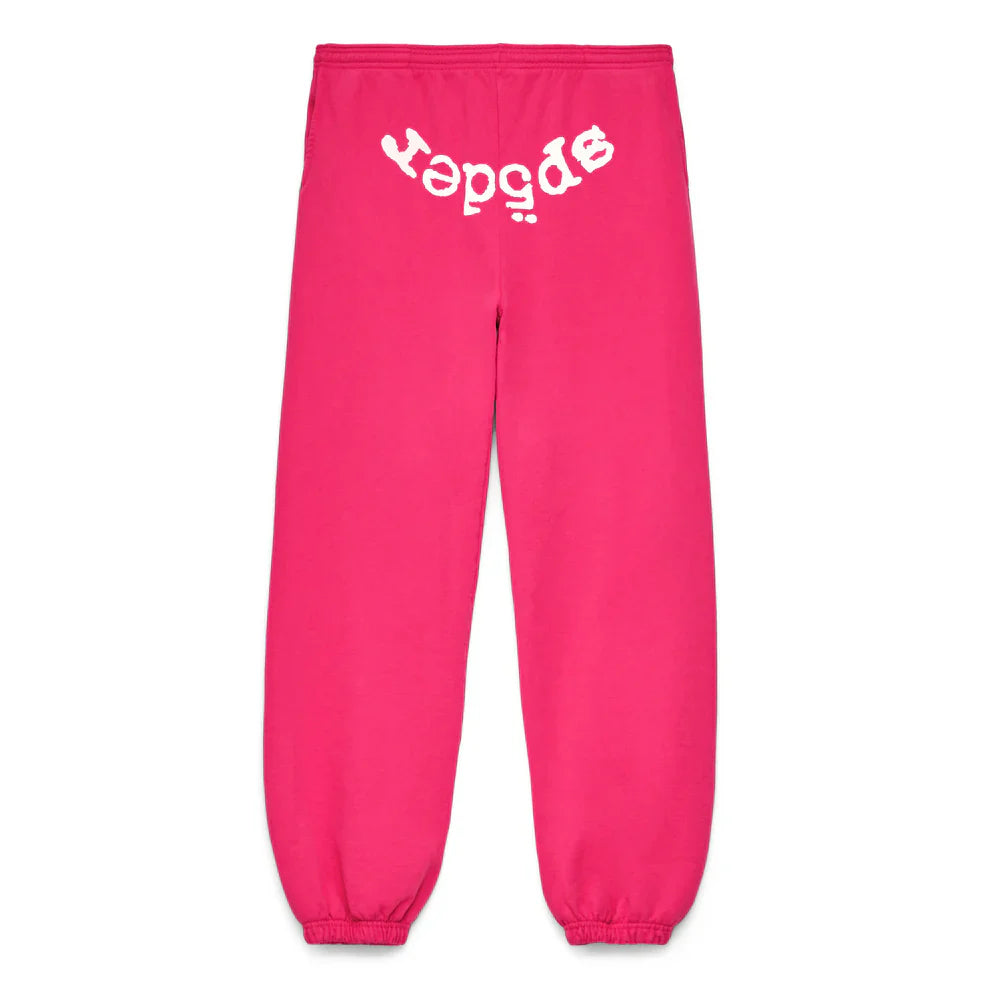 Unisex pink cotton Sp5der sweatpants featuring a bold front logo print, elastic cuffs, and waistband for a comfortable streetwear look.
