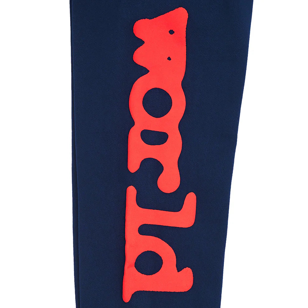 The Sp5der Sweatpants Navy Blue Red Side Logo Print are 100% cotton jogger pants featuring bold, wavy red "world" lettering down the side in a playful, melting font—perfect for streetwear fans.