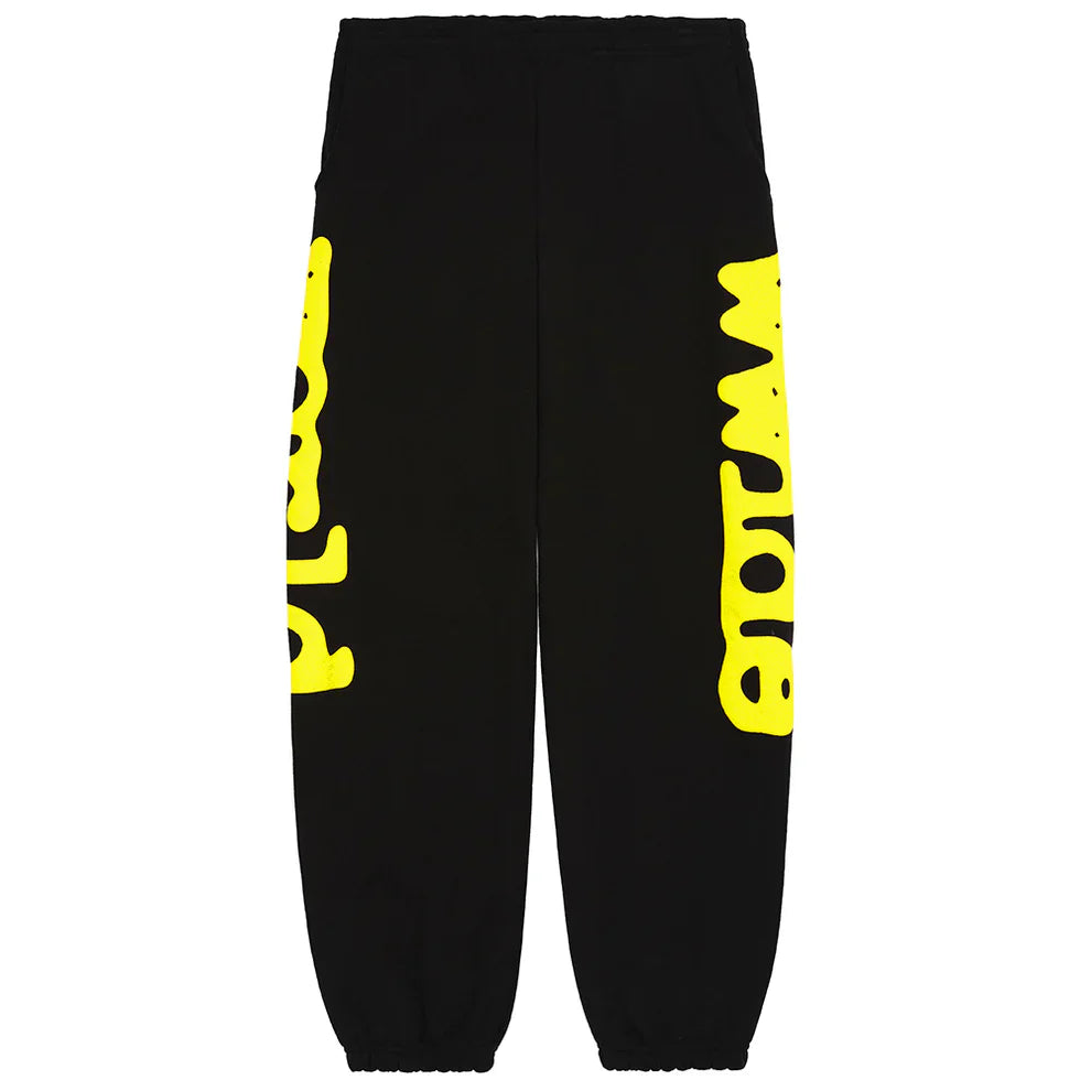 The Sp5der Sweatpants Black Yellow Side Logo Print are 100% cotton streetwear jogger pants with bold yellow logo graphics down each leg, plus an elastic waistband and cuffs for comfort.