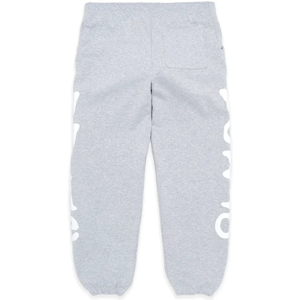 100% Cotton Sp5der Sweatpants for Men – Grey streetwear jogger pants featuring a relaxed fit, elastic waistband and cuffs, right back pocket, and bold white graphic print down both outer legs.