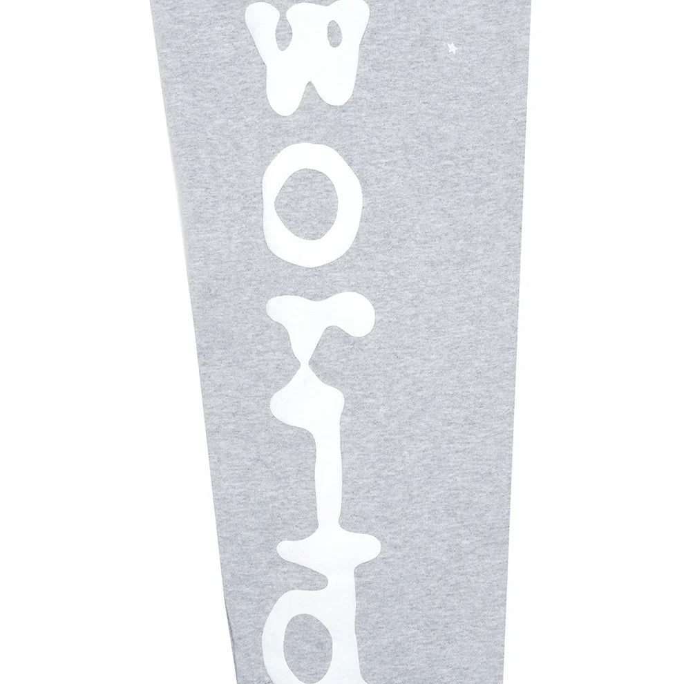 The 100% Cotton Sp5der Sweatpants for Men are grey streetwear jogger pants featuring a bold graphic print and relaxed fit—ideal for adding a playful, stylish vibe to your outfit.