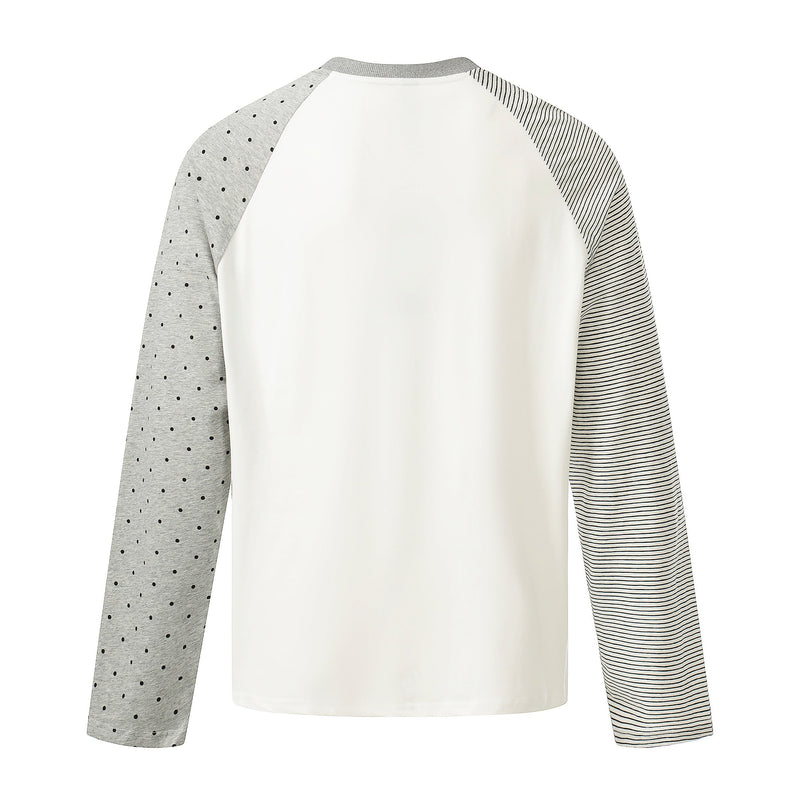 Back view of white raglan tee with gray polka dot left sleeve and gray striped right sleeve