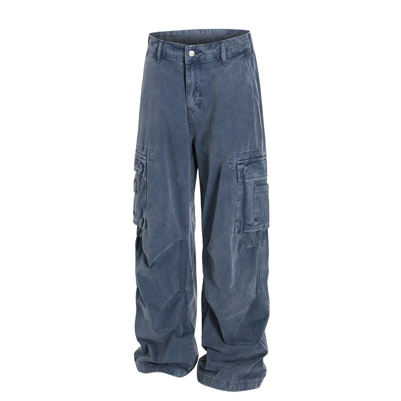 Washed blue wide-leg cargo pants with flap cargo pockets, front angled view