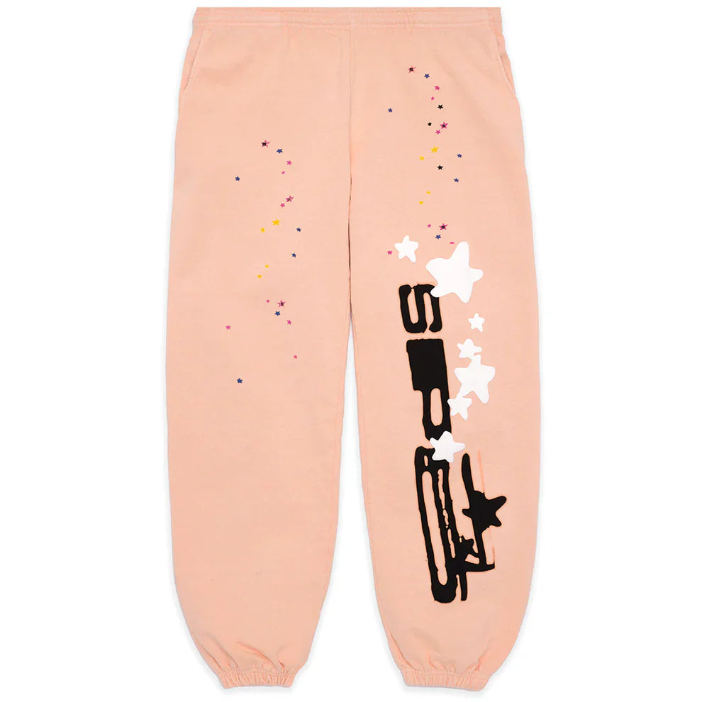 100% Cotton Sp5der Sweatpants – Unisex peach jogger pants with a relaxed fit, featuring vertical logos and star graphics—perfect for comfortable streetwear style.