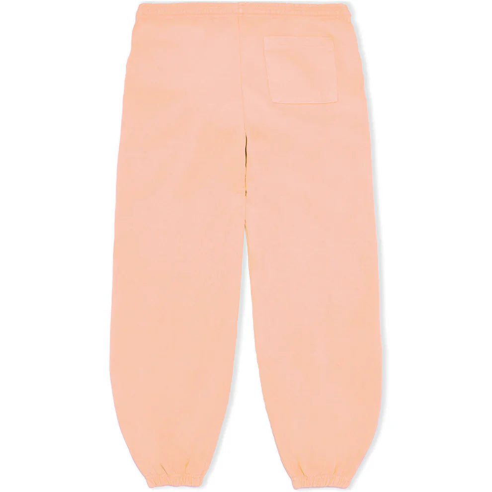 100% Cotton Sp5der Sweatpants – Unisex Peach Jogger Pants with vertical logo and star graphics. Relaxed fit features elastic waistband, ankle cuffs, and a right back pocket. Pants are laid flat with the back facing up.