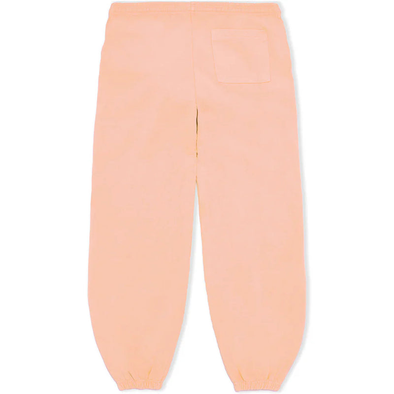 100% Cotton Sp5der Sweatpants – Unisex Peach Jogger Pants with vertical logo and star graphics. Relaxed fit features elastic waistband, ankle cuffs, and a right back pocket. Pants are laid flat with the back facing up.