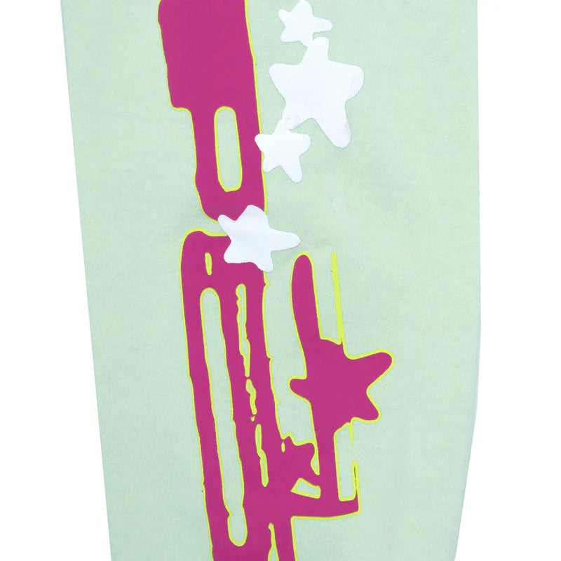 Bold, modern design inspired by 100% Cotton Sp5der Sweatpants – Unisex Mint Green Jogger Pants featuring a vertical magenta logo and layered white and yellow stars for standout streetwear style.